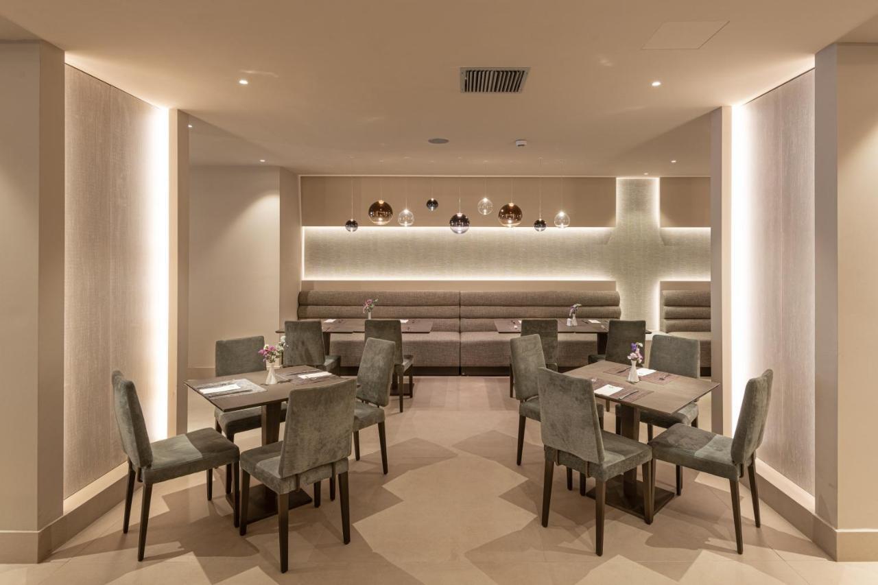 Holiday Inn Thessaloniki By Ihg Zewnętrze zdjęcie The interior of the restaurant